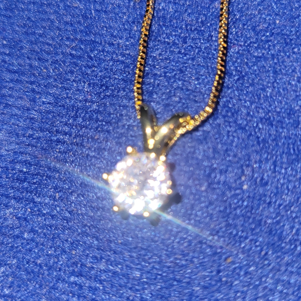 Elegant Gold and Silver Pendant Necklace